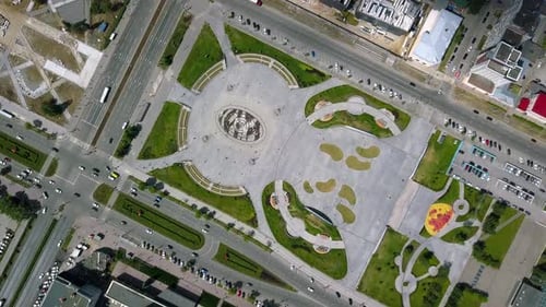 Aerial view of the city park on a sunny autumn evening