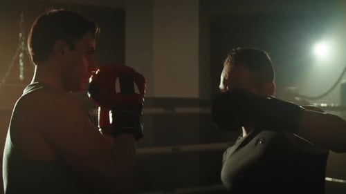Two Fighter on the Ring of the Gym