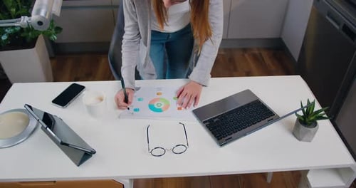 Top view female business worker making data analysis and business statistics, concept of businesswom