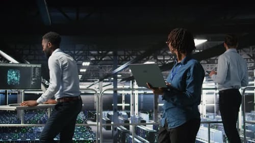 Data Center Software Developers Using Devices to Review AI LLM Visualizations