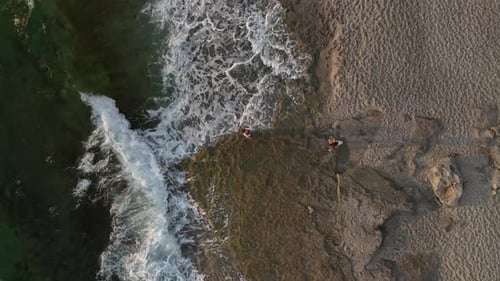 Aerial View The Mediterranean Horizon Lights Up with Vibrant Hues During Sunset with Dramatic Clouds
