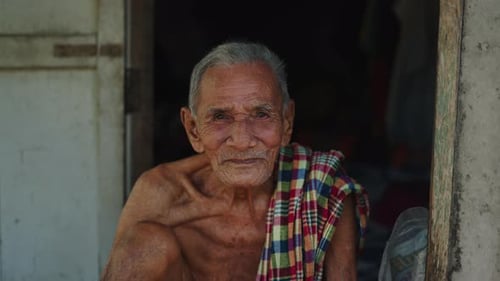Elderly Man Portrait in Rural Home Setting