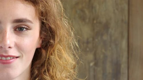 Close Up of Woman's Face Smiling in Studio