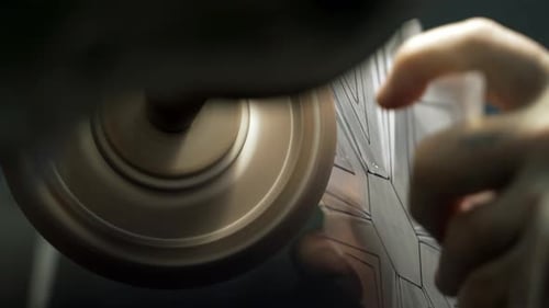 Manual Engraving of Crystal and Jewelry on a Machine Closeup