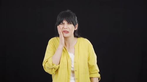 Woman with toothache.