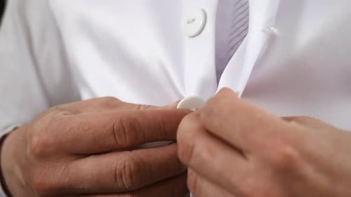 Adult Buttoning Crisp White Shirt Close Up