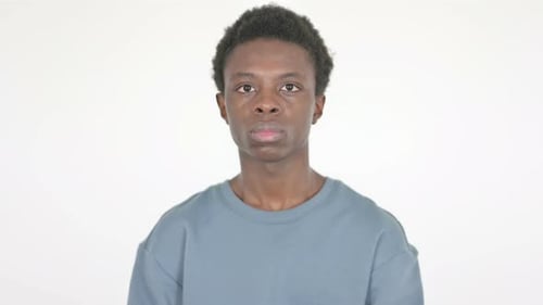 Serious Young African Man on White Background