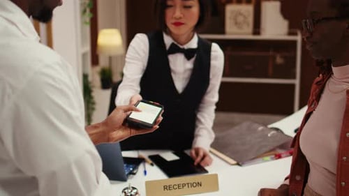 Paying with Phone at Reception Desk