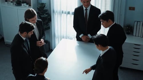 Top view of business team pointing at table while brainstorm idea. Directorate.