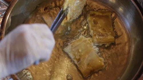 Frying Dough in Hot Oil