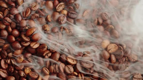 Roasting Coffee Beans with Smoke on Dark Background Close Up Arabica Robusta Colombian Beans