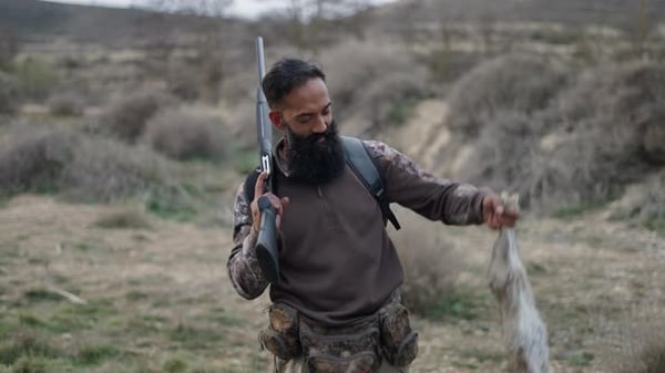 Man with Rifle Holds Rabbit After Hunt, Nature Stock Footage ft. hunter ...