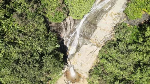 waterfall flowing over the rock
