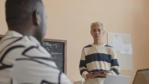 Teacher Asking Student during Programming Class in College