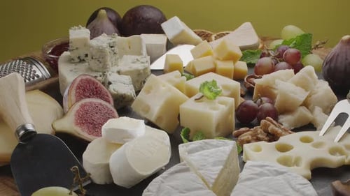 Delicious Cheese Board with Figs and Grapes