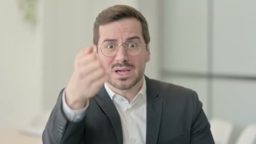 Expressive Man Gestures During Business Conversation