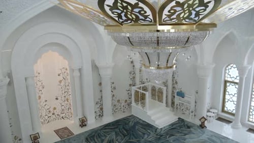 Massive jeweled chandelier inside a mosque