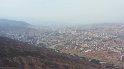 Aerial panorama of Tbilisi, Georgia. 4k footage. Pan to the left.