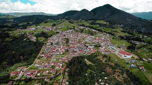 Aerial view Colonial Town Surrounded by Mountains and Lake - Guatavita, Colombia