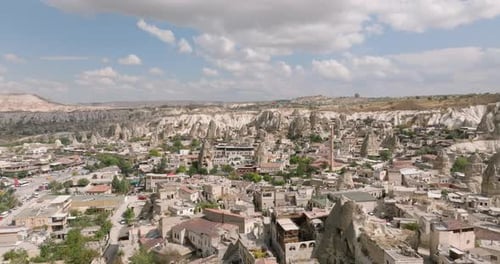 A Drone Reveals Göreme Amidst Sculptural Peaks of Cappadocia, Turkiye's Tapestry