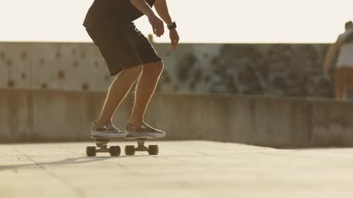 A Man Skating at the Skate Park