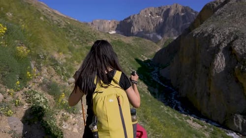 Tourist Woman Trekking on Mountain Travel