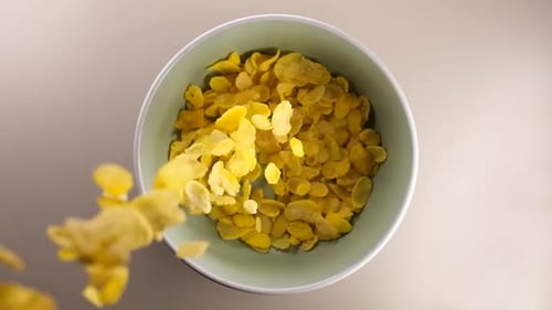 Cinematic Morning Breakfast Slow Motion Cornflakes Cereal with Milk
