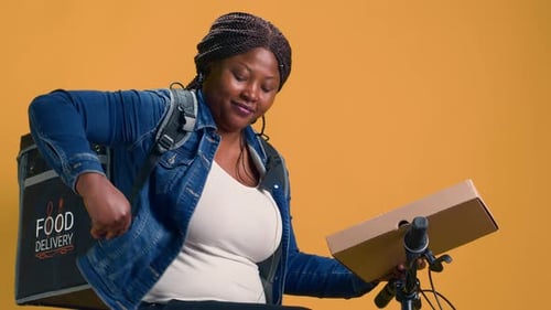 Woman Offering Pos for Delivery Payment