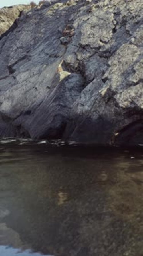 Rocky Cliff Jutting Into the Ocean Portugal