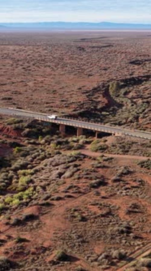 Vertical Outback Road and Bridge with Car in Remote South Australia