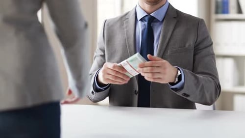 People, Business, Corruption, Bribery and Fraud Concept - Close Up of Businessman