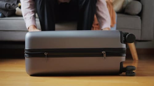 Opening Suitcase for Travel at Home