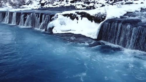 Waterfall in Iceland Snowy Ice Mountain River in Winter Nature