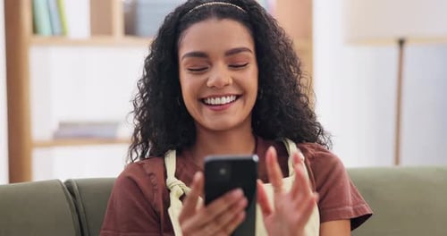 Woman, laughing and scroll with phone on sofa for streaming, social media post