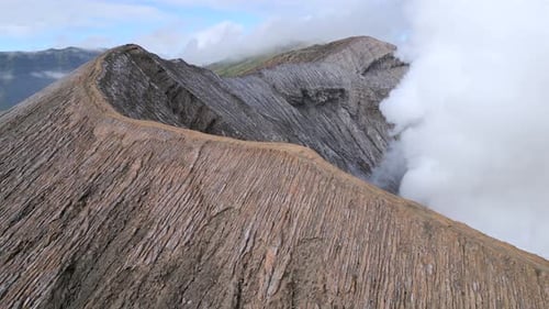 Aerial View of Steaming Mount Bromo Volcanic Crater in East Java Indonesia