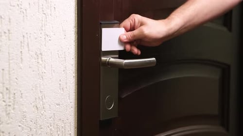 Hand Open Hotel Room Door with Electronic Card Key Magnetic Key to Unlock Doors