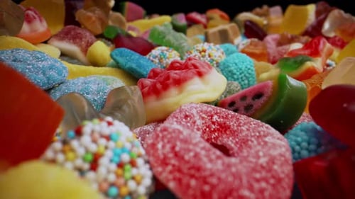 Vibrant Colors of Jelly Gummy CandiesSweet Bears With Sugary CoatingMacro View