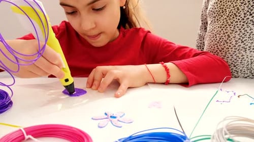 Girl Creates Art with 3D Pen with Sibling