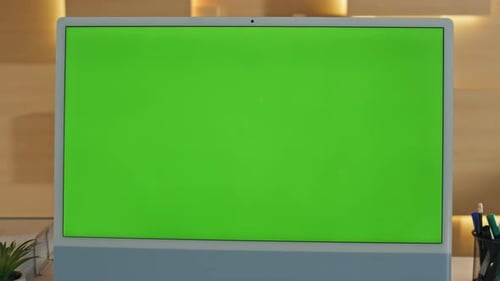 Closeup Mockup Computer Display Standing on Office Desk Green Screen Monitor