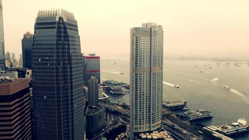 Sea, harbor and drone in city with buildings, skyscraper and infrastructure to travel by boat