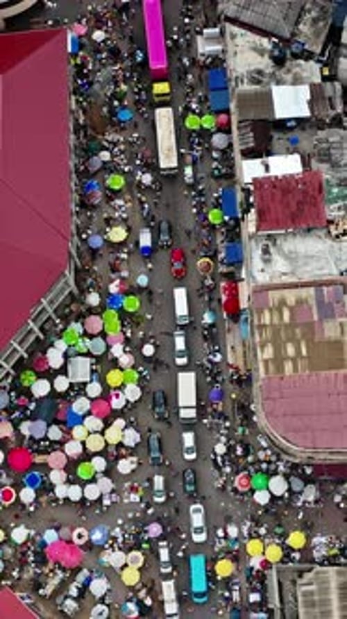 Vibrant market activity in Accra, Ghana captured from above