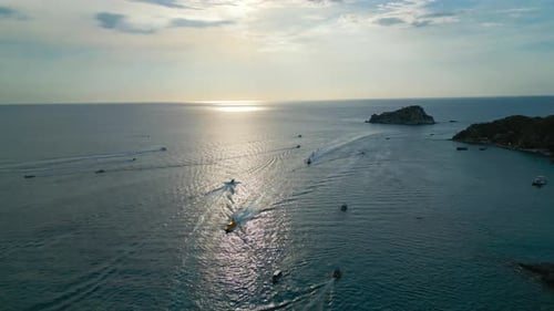 Aerial View Rodadero Flying Over Taxi Boats At Sunset Pull Back