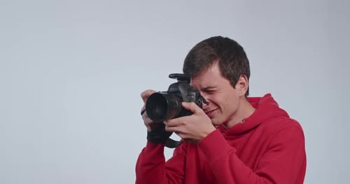 Happy Guy Photographer Professional Shoots Model in Studio Behind the Scenes