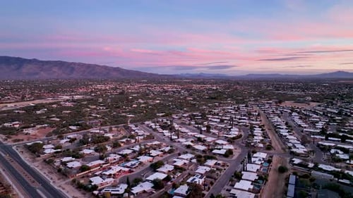 Cinematic slowly panning drone shot during sunset of Tuscon Arizona