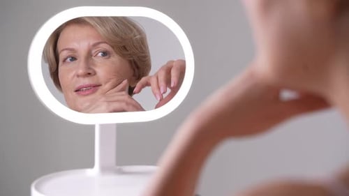 Confident Woman Enjoying Her Aging Skin