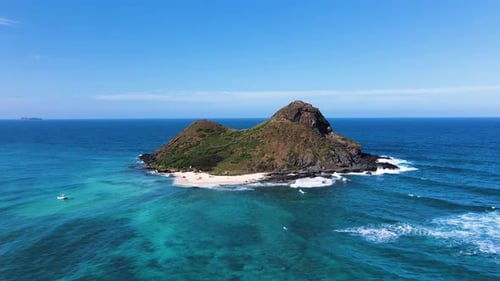 Ilha havaiana Na Mokulua, na costa tropical de Kailua, em Oahu, aérea estática