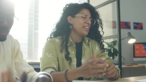 Businesswoman Talking on Office Meeting