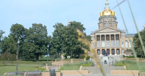 Des moines Iowa state capitol building stands tall on a sunny day
