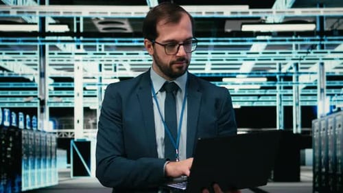 Data Center System Administrator Using Laptop to Futureproof Company Network