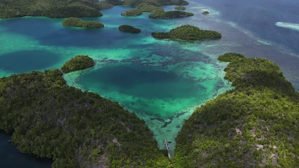 Islets By The Blue Sea In Sulawesi Island In Indonesia. - aerial shot ...